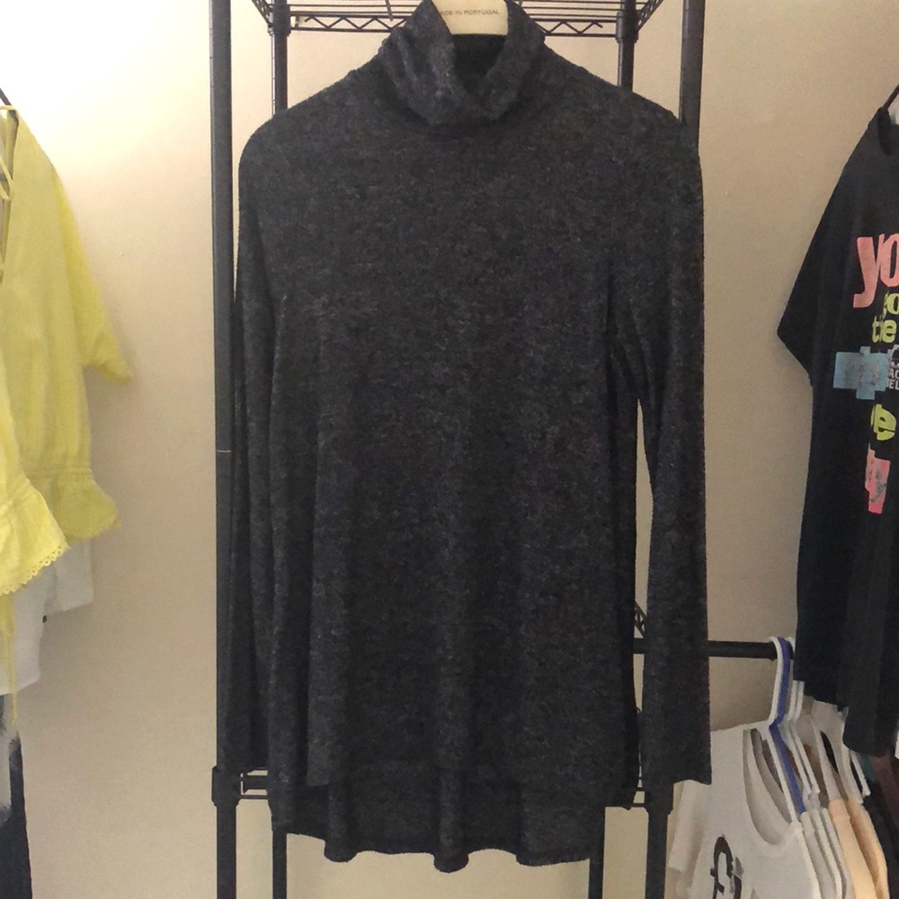Dark grey turtleneck.
